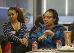 Cinderria Harwell, a 2022 Odyssey graduate, speaking at an event. Photo by Jonás Tijerino.