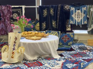 Baursaki and traditional Kazakh dress on display.